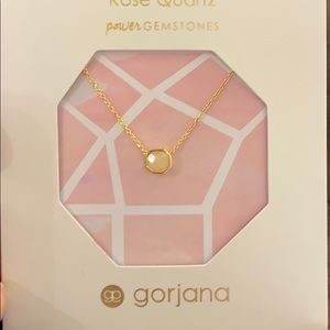 Gorjana rose quartz necklace w/gold dipped chain.